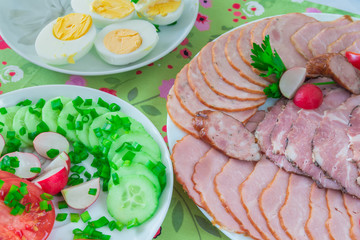 platter with cold cuts and vegetables
