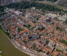 Obraz premium Deventer, Holland, July 11 - 1990: Historical aerial photo of the city Deventer situated on the east bank of the river IJssel