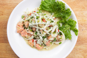 Spicy salmon salad on the place