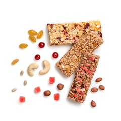 Granola bar with nuts and dry fruit berries. Cereal healthy snack. Fitness food. Protein muesli bars isolated on white background. Sport oatmeal bar, top view