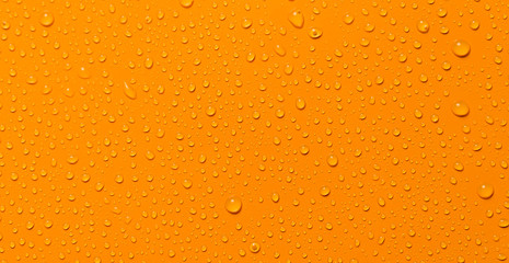 close-up abstract water drop orange background