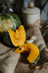 delica pumpkin in the garden. Kabocha, is Japanese pumpkin slice or green pumpkin on Grey background