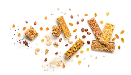 Granola snack fall. Cereal bar with nuts and dry fruit berries flying. Fitness diet food. Muesli...
