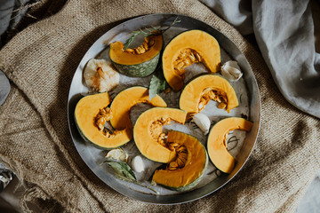 delica pumpkin in the garden. Kabocha, is Japanese pumpkin slice or green pumpkin on Grey background