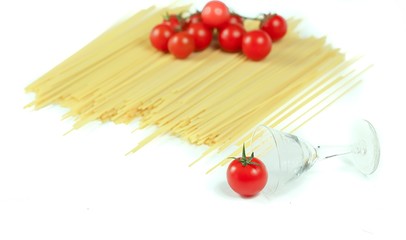 
typical ingredients of Italian cuisine: spaghetti and cherry tomatoes