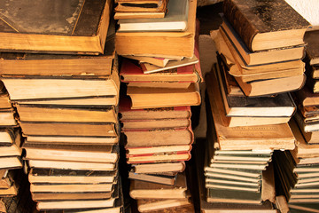 Pile of old books stacked together