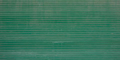 green vintage door roll up metal texture background