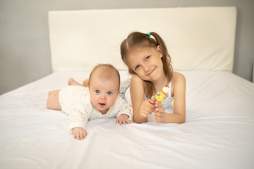Two kids on the bed