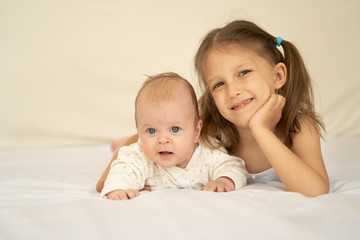 Two kids on the bed