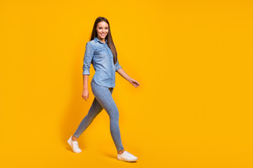 Full length photo of attractive sweet nice girl go walk enjoy holiday time with friends wear modern youth outfit gumshoes isolated over shine color background