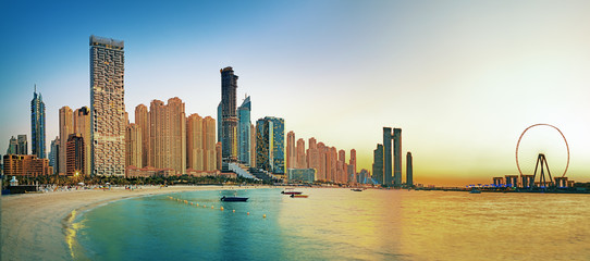Naklejka premium Amazing and Luxury Dubai Marina - famous Jumeirah beach at sunrise, United Arab Emirates