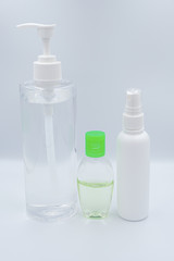 Alcohol gel and sanitizer hand gel cleaners for anti Bacteria and virus on White Background, People using alcohol gel to wash hands to prevent COVID-19 virus