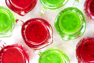 Handmade colorful jelly in a glass, top view