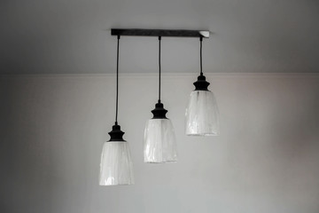 three lamps in the white room