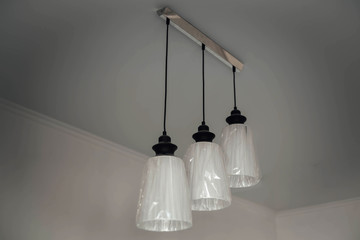 three lamps in the white room