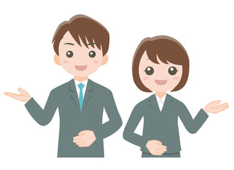 スーツ姿の男女が案内している 