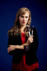 young woman with makeup brush