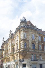 Historic beige stone building in lviv
