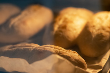 baked breads in oven with baking paper
