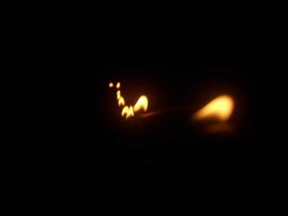 burning candles in the dark
