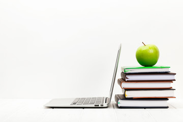 Workspace with laptop computer and supplies