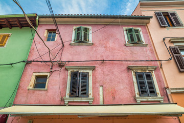Colorful facade of an old houses in Pula town, Croatia, Europe.