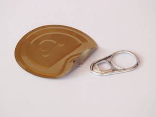 Aluminum lids.Ring pull of cans isolated on white background.