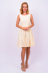 Full body shot of beautiful blonde businesswoman