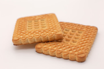 two cookies on a white background