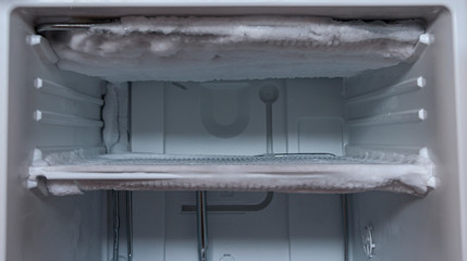 a very icy open freezer