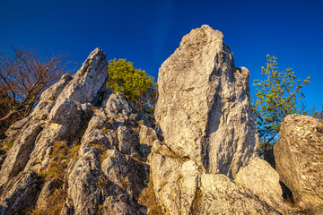 Spring landscape with valley and mountains in background. View from The Sunny Rocks in The Rajec Valley, Slovakia, Europe.