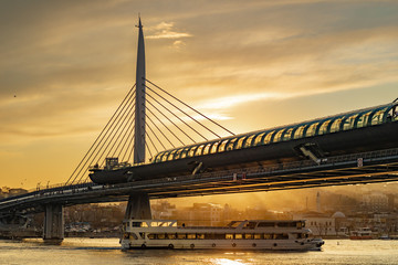 Boat passing under the bridge, Sunset Reflection, Shadow, Yellow Light, Metro Bridge, Clouds, Steamboat, Istanbul, Halic