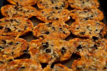 homemade hot sandwiches cooked with hands with different fillings lie in a protvin,quick sandwiches at home,fast food at home,vegetarian and meat sandwiches on one tray