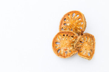 Dry bael fruit isolate on white background, Thai dry herb for healthy drink