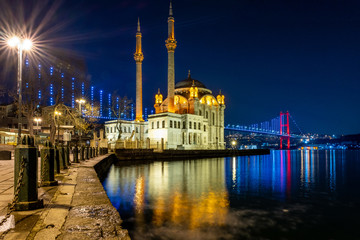 Fototapeta na wymiar Istanbul landscape at night. Ortakoy Mosque and bosphorus bridge