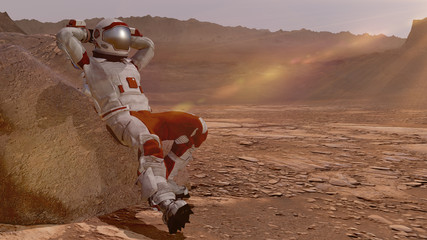 Astronaut sitting on Mars and admiring the scenery. Exploring Mission To Mars. Futuristic Colonization and Space Exploration Concept. Elements of this video furnished by NASA. 3d rendering. © merlin74