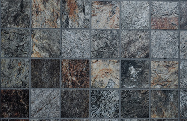 The colorful vintage ceramic tiles wall decoration,tile mosaic in the bathroom,vintage mosaic tiles texture background,gray and black mosaic wall texture and background