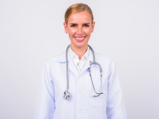 Portrait of happy blonde woman doctor smiling