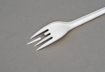 a broken plastic fork