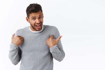 You talking about me, mean I did it. Shocked young man with offended pride pointing himself as...