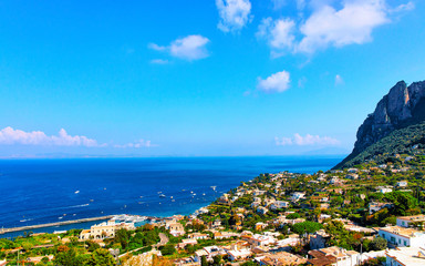 Aerial view with Capri Island in Tyrrhenian sea reflex