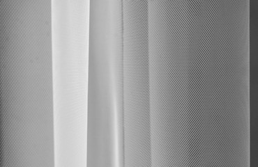 Fototapeta premium White tulle fabric abstract background,white tulle background,selective focus