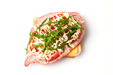 Sandwich of bread for toast, sturgeon, tomatoes, arugula, cheese and mayonnaise on a white...
