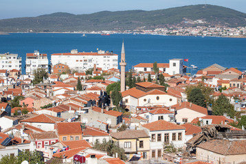 Naklejka na ściany i meble Ayvalik, Turkey - a splendid village on the Aegean coast of Turkey, Ayvalik is presents a wonderful display of typical ottoman houses, with their red roofs