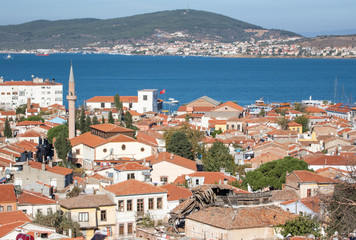 Fototapeta na wymiar Ayvalik, Turkey - a splendid village on the Aegean coast of Turkey, Ayvalik is presents a wonderful display of typical ottoman houses, with their red roofs