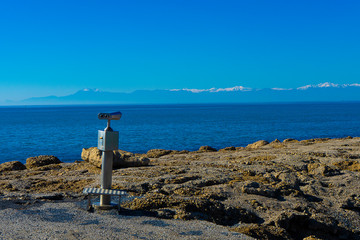 beautiful landscapes of white, green mountains and a spectacular blue sea