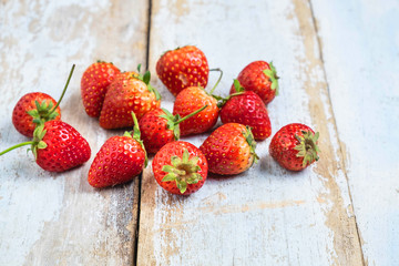 Fresh strawberry fruit on a wooden table