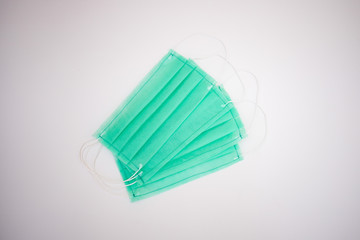 Protective, antivirus, green face mask for COVID-19 and different diseases. Do not let the virus spread!