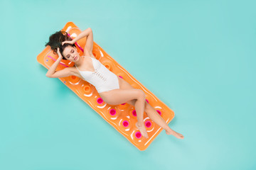 Full length high angle above flat lay view photo of beautiful lady lying swimming big mattress...