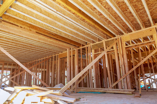Interior with wood framing beam of new house under construction beam wood